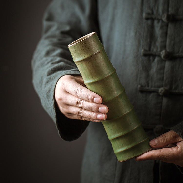 Bamboo Vase And Flower Arrangement