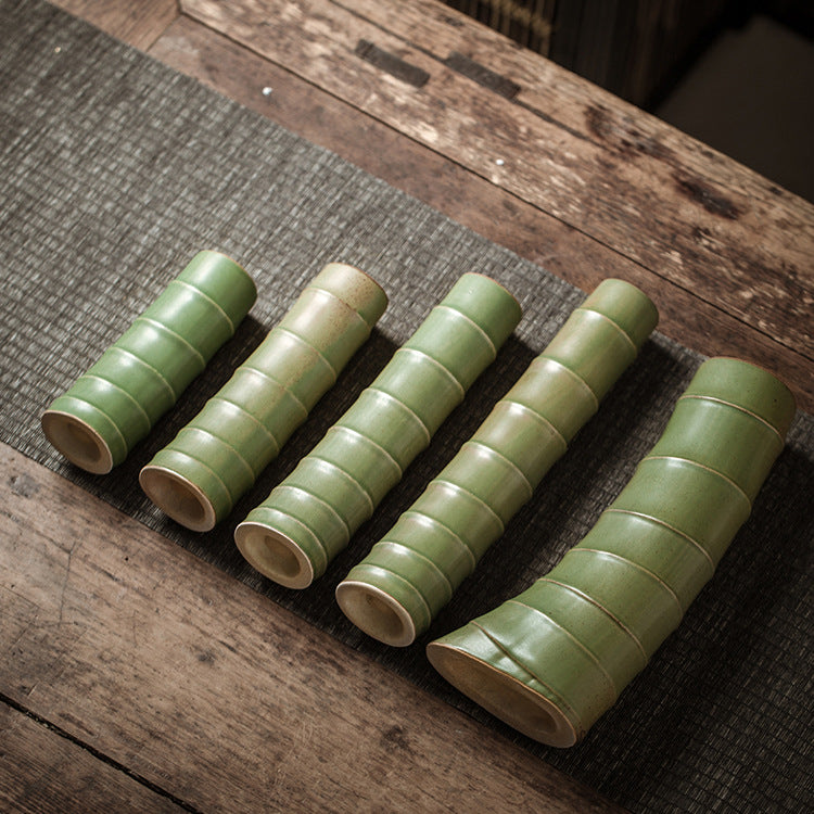 Bamboo Vase And Flower Arrangement