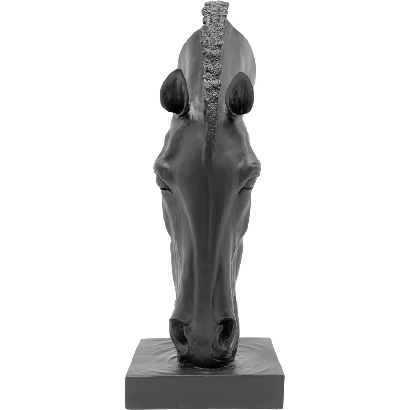 The artificial stone sculpture gives the impression that it could neigh at any moment, especially after indulging in the gently undulating water. It's not just equestrians who find themselves instinctively reaching out to stroke the noble black horse's he